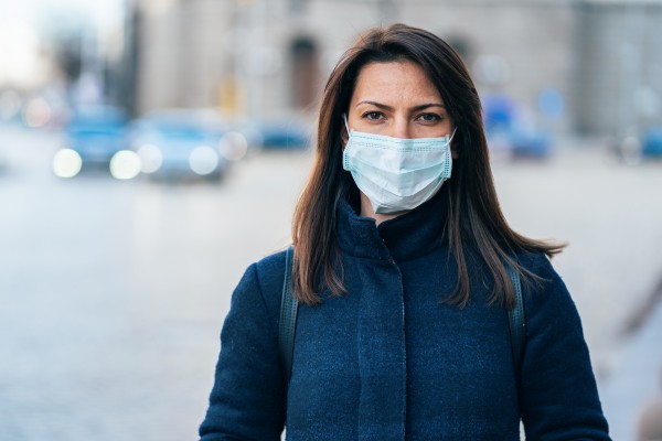 Image of a woman wearing a covid mask